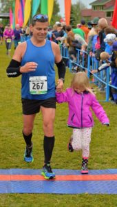 running dad with daughter